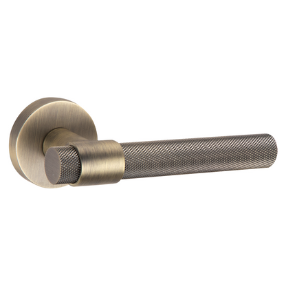 Round rosette handle in Zamak